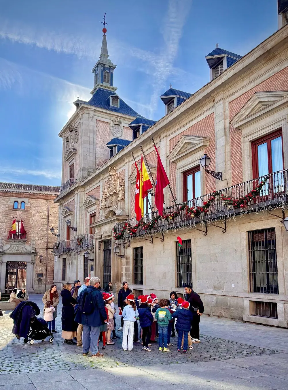 Families exploring Plaza de la Villa
